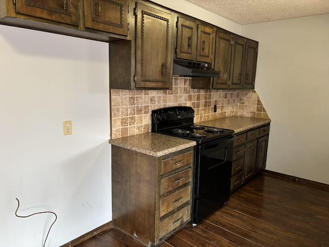 kitchen with black range with electric stovetop, dark hardwood / wood-style floors, and dark brown cabinets