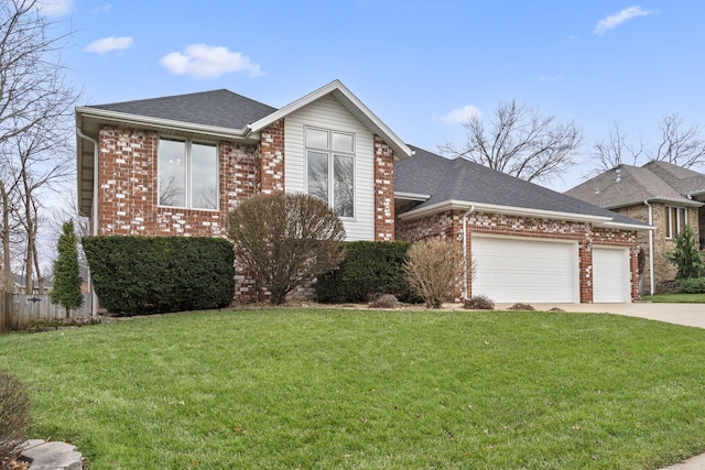 view of front facade with a garage and a front lawn