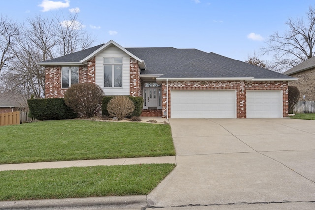 view of front of property featuring a garage and a front yard