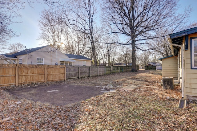 view of yard with central AC unit