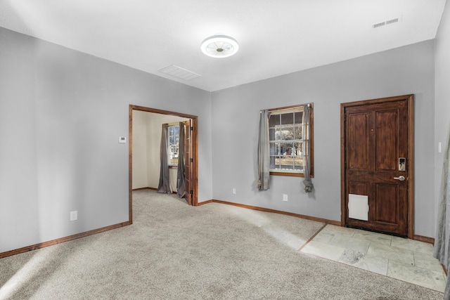 view of carpeted spare room