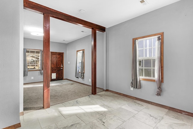 view of carpeted spare room