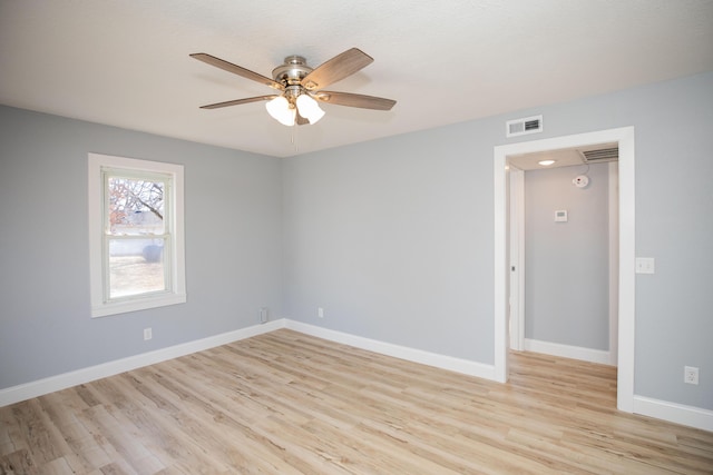 unfurnished room featuring light hardwood / wood-style floors and ceiling fan