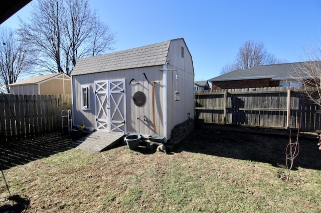 view of outdoor structure featuring a yard