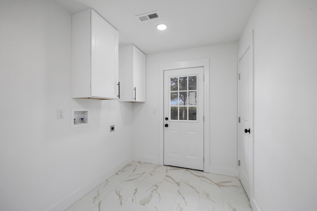 laundry area featuring hookup for a washing machine, cabinets, and hookup for an electric dryer