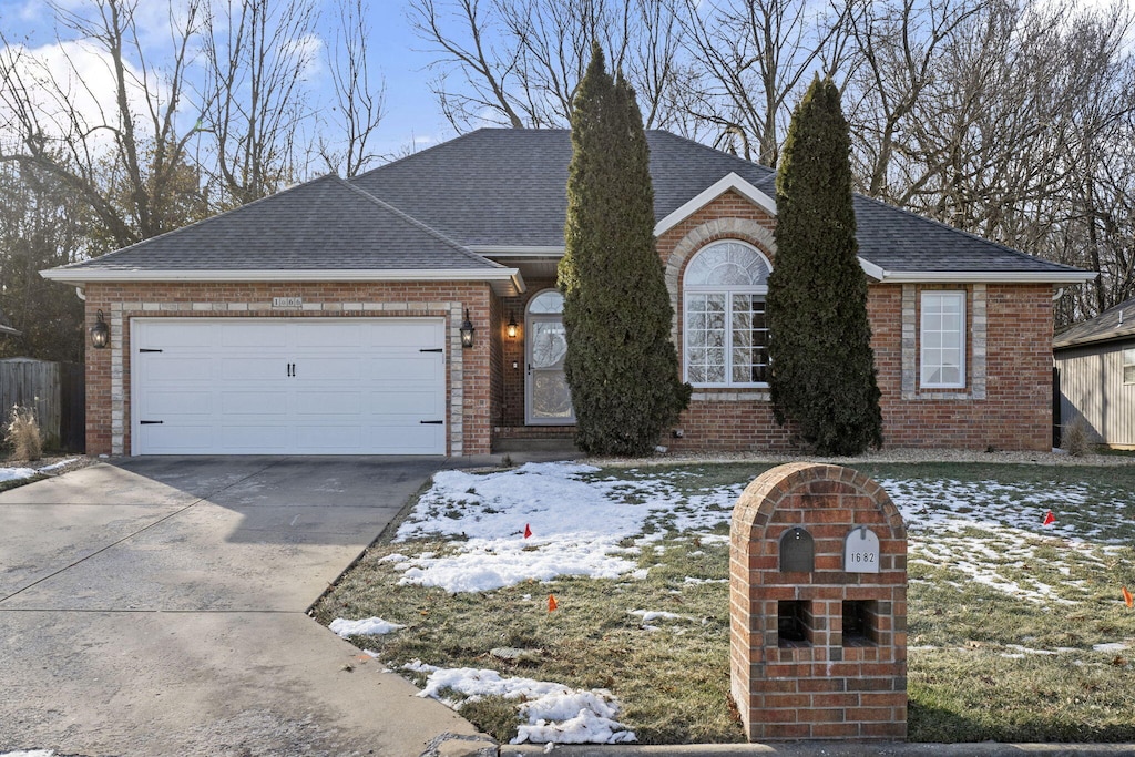 view of front of home with a garage