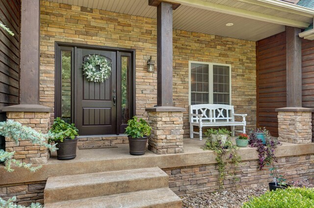 10350 Indian Ridge Ln, Carthage, MO 64836 - doorway to property with a porch
