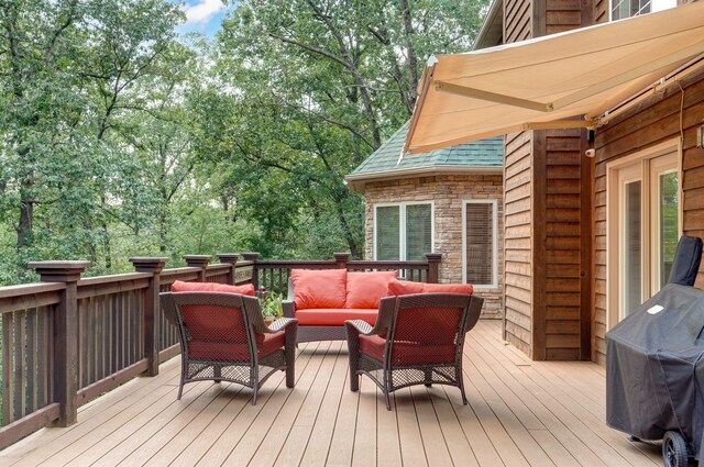 10350 Indian Ridge Ln, Carthage, MO 64836 - wooden deck featuring an outdoor living space and area for grilling