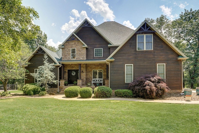 10350 Indian Ridge Ln, Carthage, MO 64836 - craftsman inspired home featuring covered porch and a front lawn