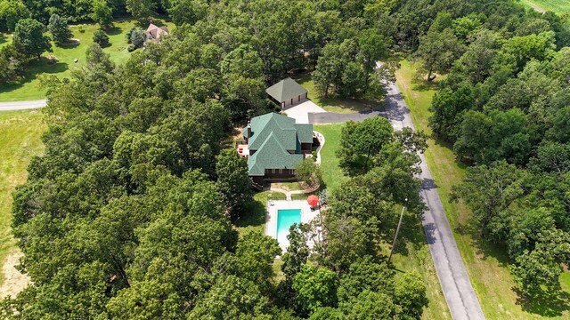 10350 Indian Ridge Ln, Carthage, MO 64836 - aerial view of a pool area and a heavily wooded area