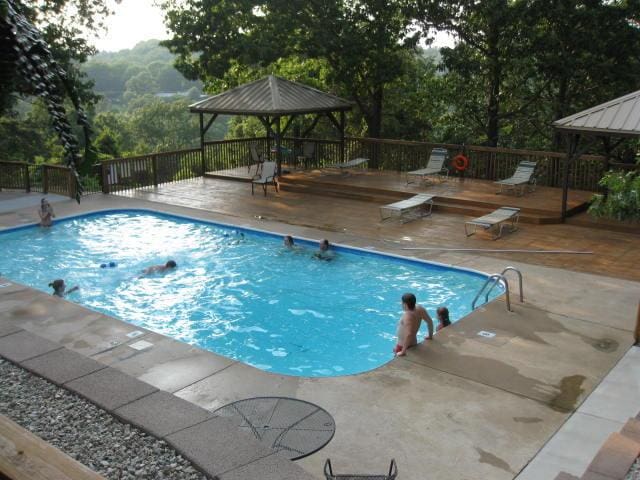 412 Notch Ln Unit 9, Branson West, MO 65737 - view of swimming pool with a gazebo and a deck