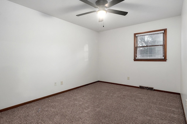 unfurnished room with carpet floors and ceiling fan