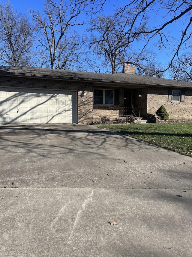 single story home with a garage