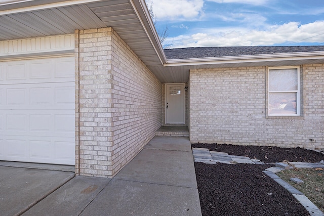 entrance to property featuring a garage