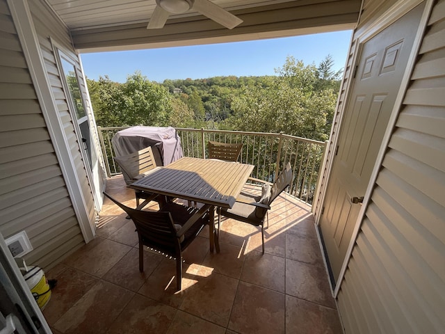 balcony featuring area for grilling and ceiling fan