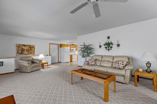 living room with light carpet and ceiling fan