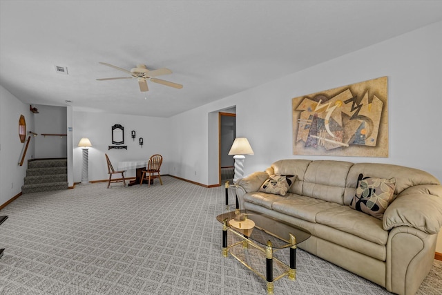 living room with ceiling fan and light carpet