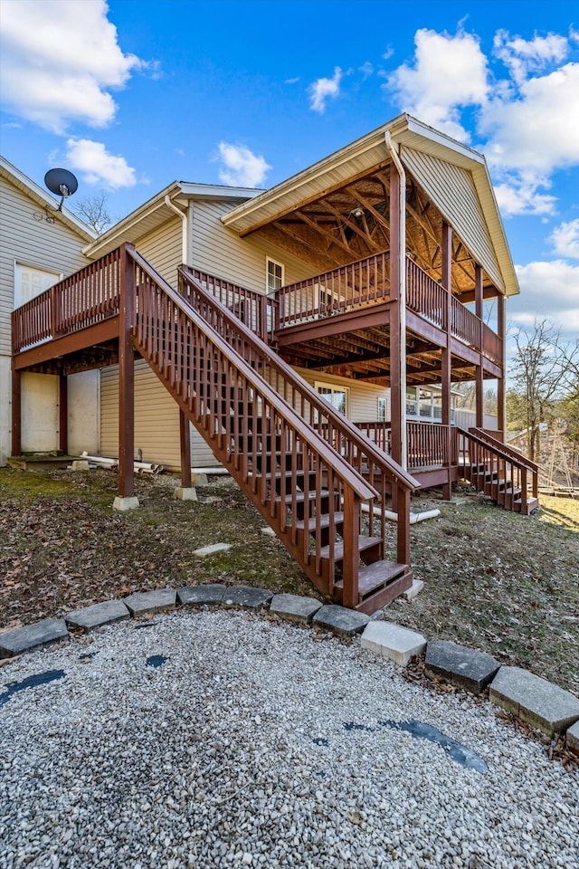 view of side of home with a deck