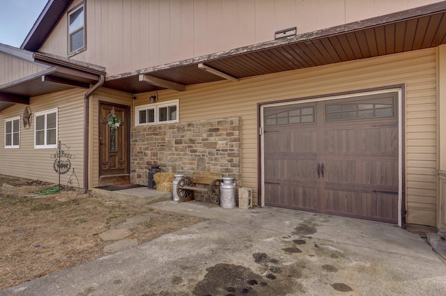 entrance to property featuring a garage