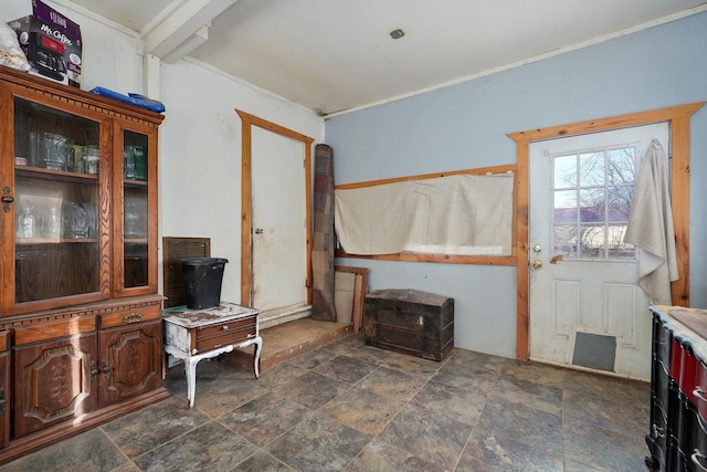 interior space featuring beam ceiling