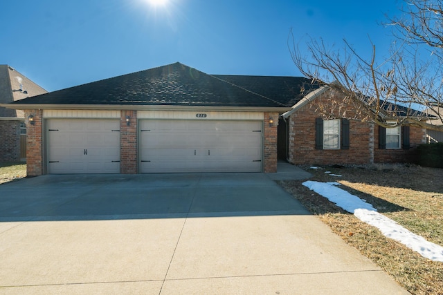 ranch-style home with a garage