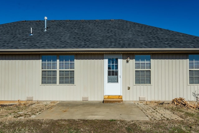 rear view of property featuring a patio area