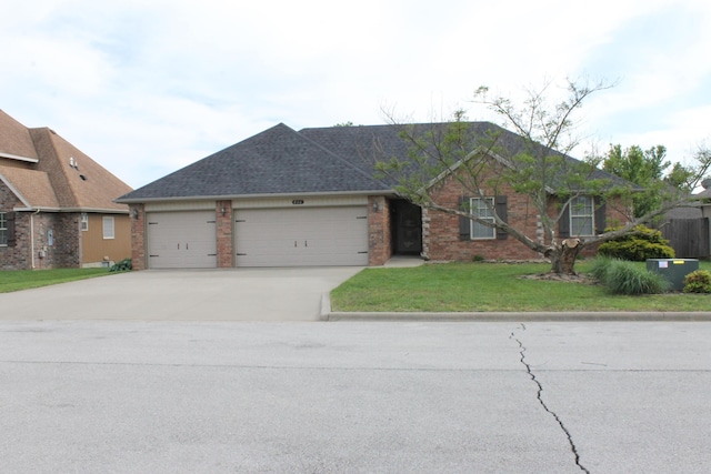 816 E Roubidoux St, Nixa, MO 65714 - ranch-style home with an attached garage, concrete driveway, a front yard, and brick siding