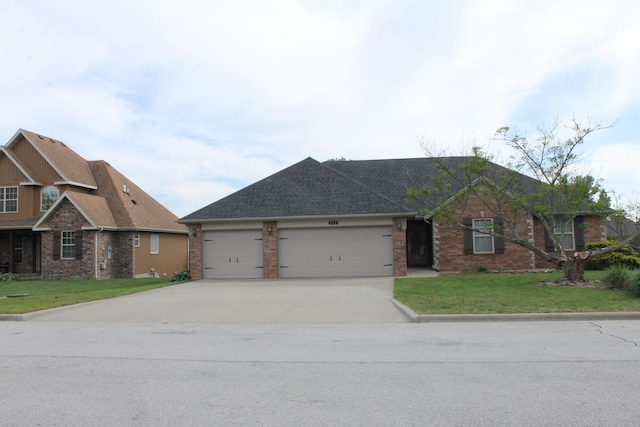 816 E Roubidoux St, Nixa, MO 65714 - view of front of home with driveway, an attached garage, a front yard, and brick siding
