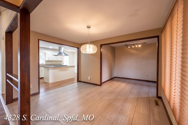 view of unfurnished dining area