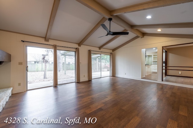 unfurnished living room with ceiling fan, dark hardwood / wood-style flooring, and lofted ceiling with beams