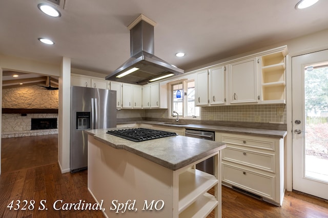 kitchen with a center island, dark wood-type flooring, stainless steel appliances, sink, and island range hood