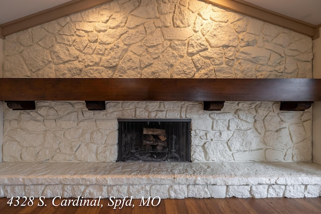 details with a stone fireplace