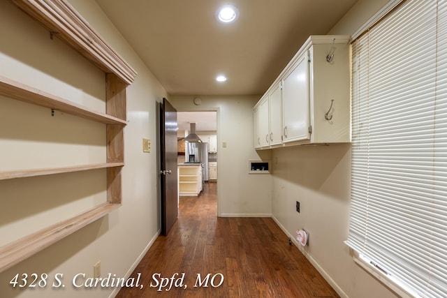 laundry area with washer hookup, dark wood-type flooring, cabinets, and electric dryer hookup