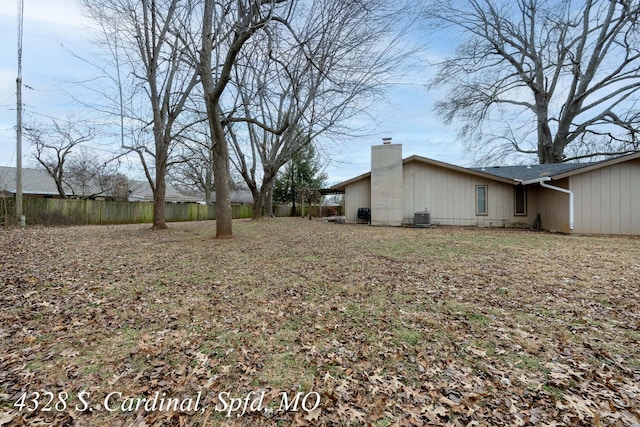 view of yard featuring central AC