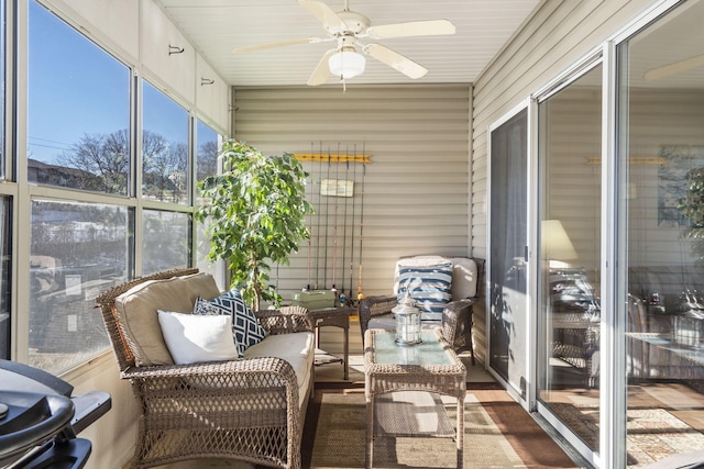 sunroom / solarium with ceiling fan