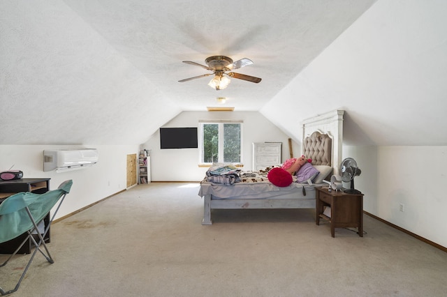 carpeted bedroom with ceiling fan, a textured ceiling, lofted ceiling, and a wall mounted air conditioner