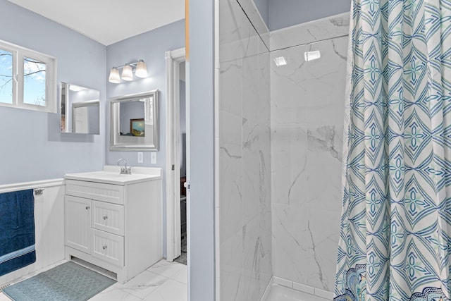 bathroom featuring vanity and a shower with curtain