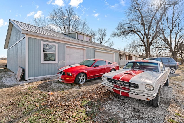 view of side of home with a garage