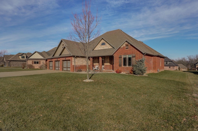 view of front facade with a garage and a front lawn