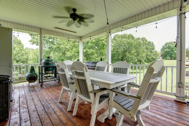 wooden terrace featuring ceiling fan