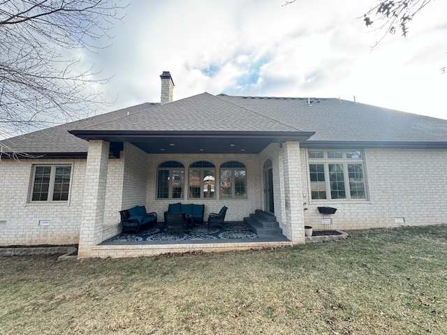 back of property featuring an outdoor living space, a patio area, and a lawn