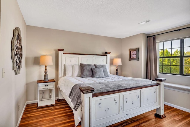 bedroom featuring wood-type flooring