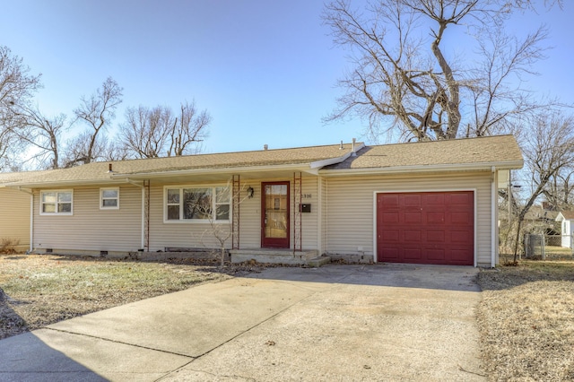 ranch-style home with a garage