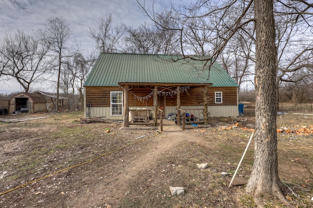 exterior space featuring a shed