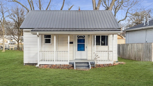 view of outbuilding featuring a lawn