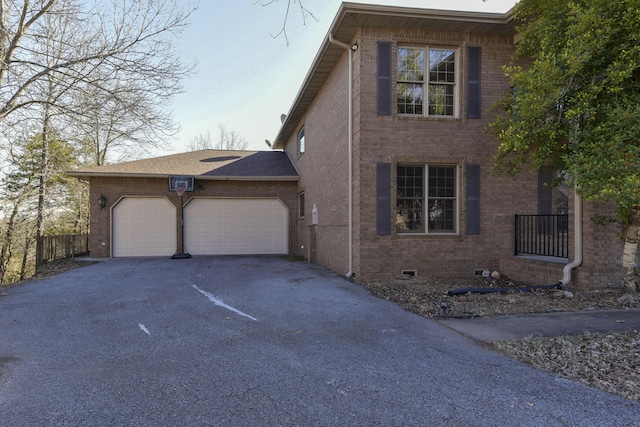 view of property exterior with a garage