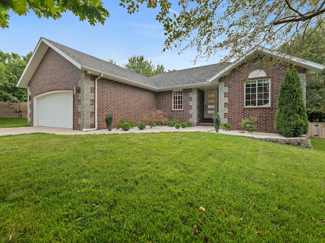 ranch-style home featuring a garage and a front yard