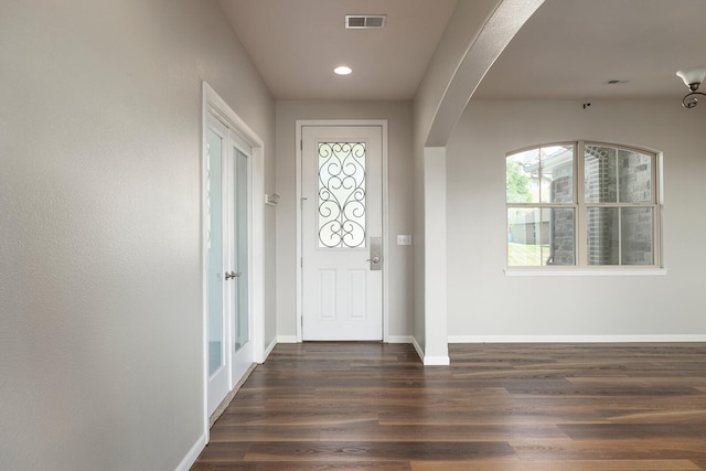 foyer with dark wood-type flooring