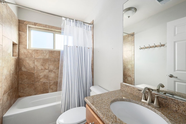 full bathroom featuring toilet, shower / tub combo, and vanity