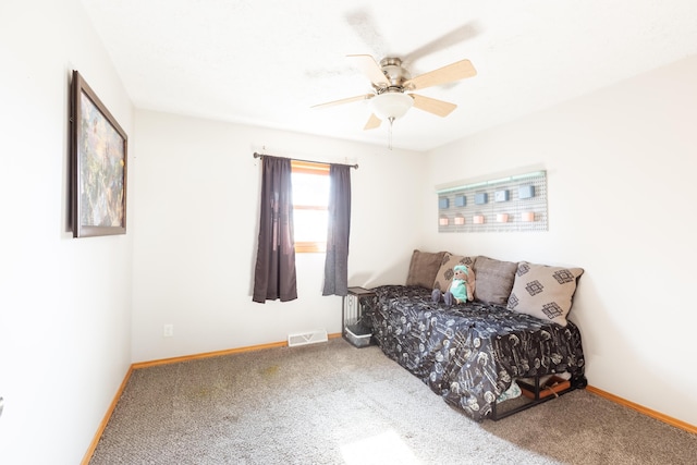 bedroom with visible vents, baseboards, ceiling fan, and carpet flooring